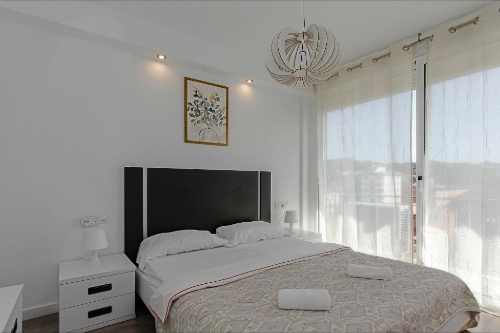 Postel nebo postele na pokoji v ubytování Apartamento Seven Seas