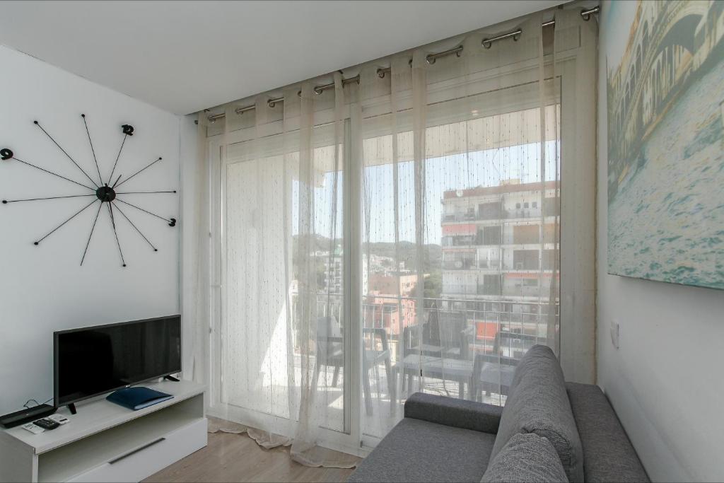 TV a/nebo společenská místnost v ubytování Apartamento Seven Seas