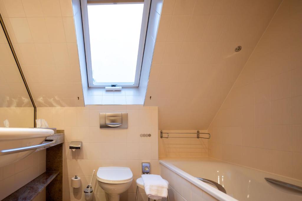Vannituba majutusasutuses Zeitgeist Rathen by STEIGER Hotels