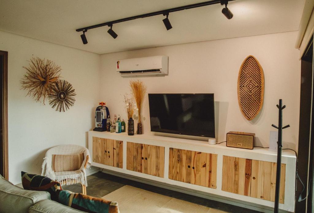 TV a/nebo společenská místnost v ubytování Pousada Moana