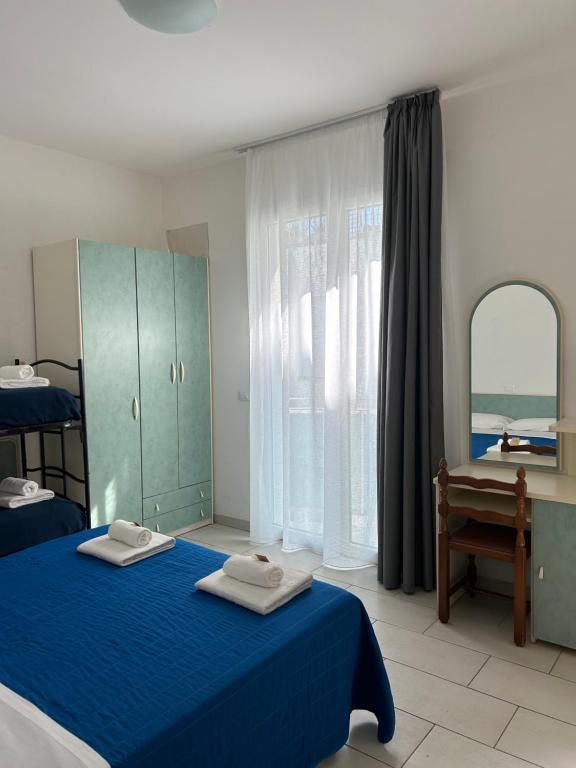 Postel nebo postele na pokoji v ubytování Hotel Zamagna