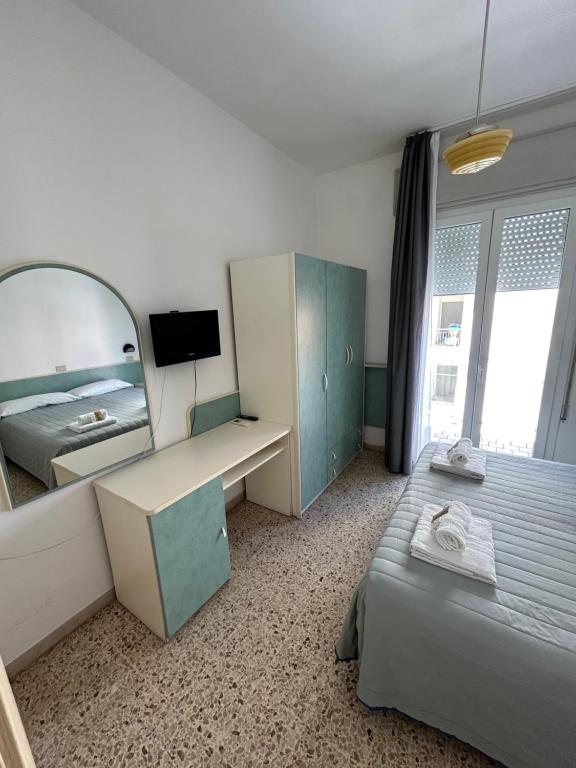 Postel nebo postele na pokoji v ubytování Hotel Zamagna
