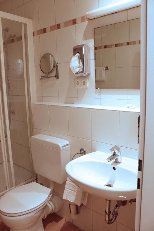 Koupelna v ubytování Isar City Hotel
