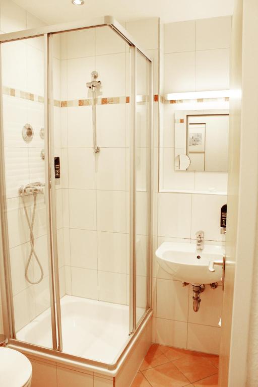Koupelna v ubytování Isar City Hotel
