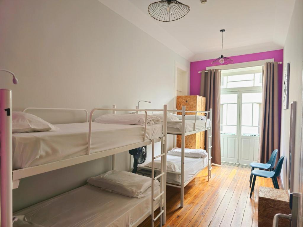 Postel nebo postele na pokoji v ubytování Santa Maria Hostel