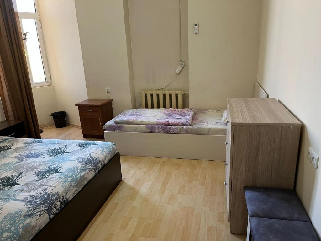 Postel nebo postele na pokoji v ubytování Classy and Cozy Hostel