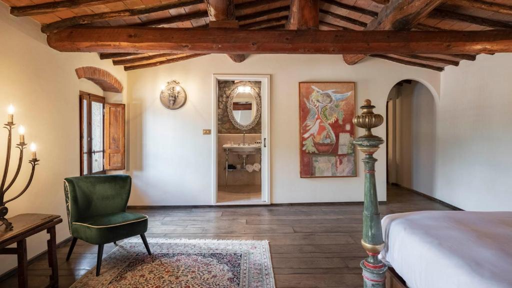 Postel nebo postele na pokoji v ubytování Villa La Selva Wine Resort