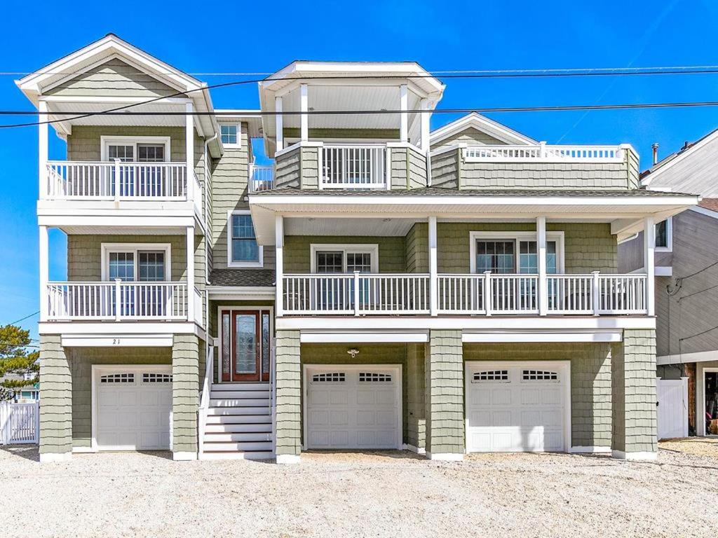 a large house with two garages at Spectacular 6 Bedroom Home On The Oceanblock In Beach Haven!!! Hot Tub!!! in Beach Haven