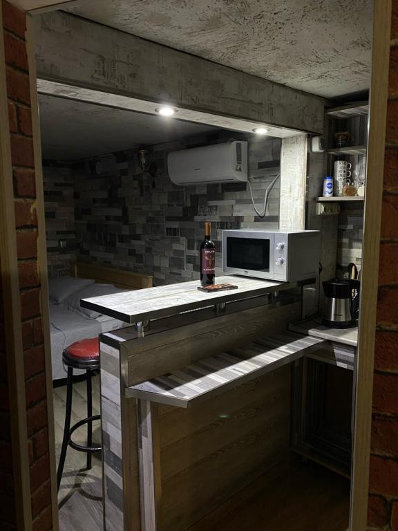 فضای داخلی Cozy Basement در تفلیس - تصویر ۳