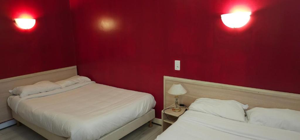 Postel nebo postele na pokoji v ubytování Hotel CÖRONA Lourdes