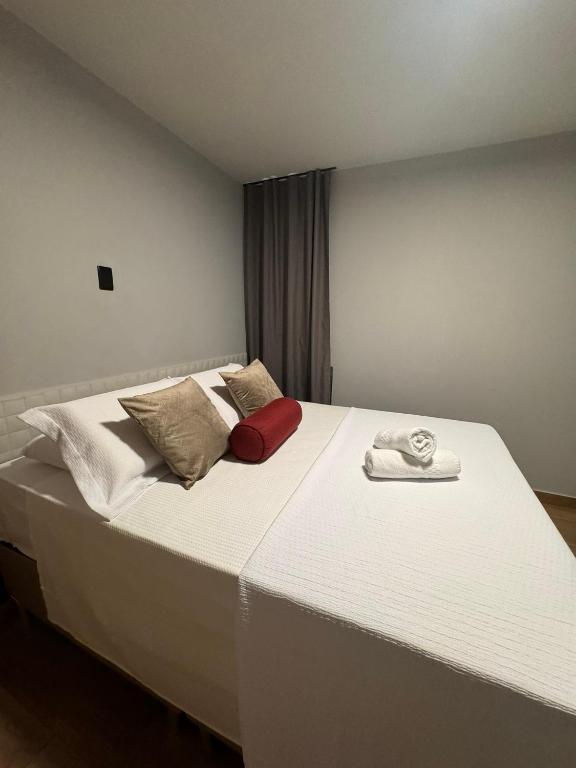 Postel nebo postele na pokoji v ubytování Hotel Caitá