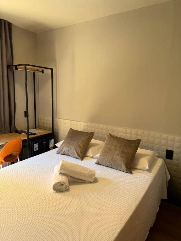 Postel nebo postele na pokoji v ubytování Hotel Caitá
