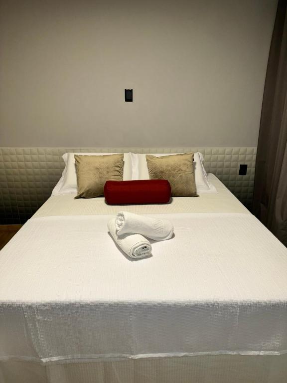 Postel nebo postele na pokoji v ubytování Hotel Caitá