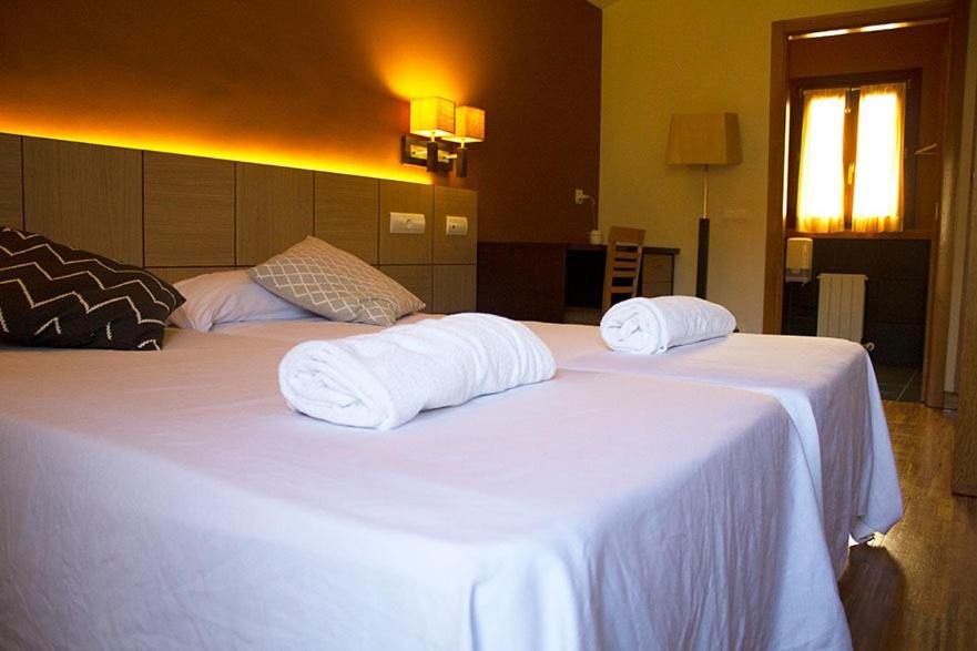 Postel nebo postele na pokoji v ubytování Hotel valle de turtzioz