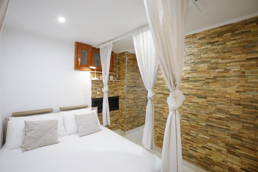 Katil atau katil-katil dalam bilik di Appartamento Suarez Vomero