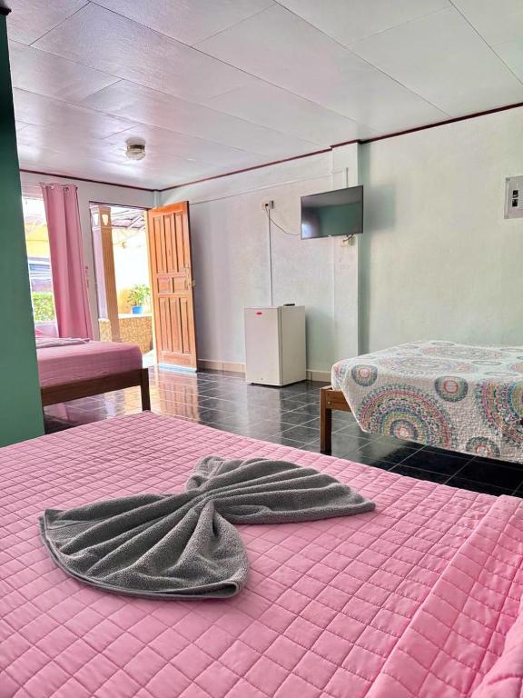Postel nebo postele na pokoji v ubytování Hotel El Chaman