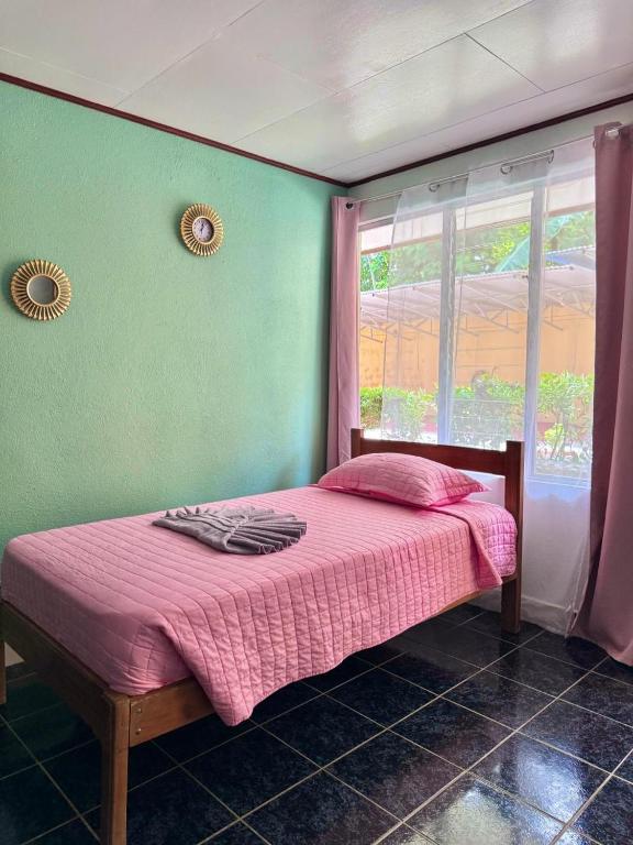 Postel nebo postele na pokoji v ubytování Hotel El Chaman