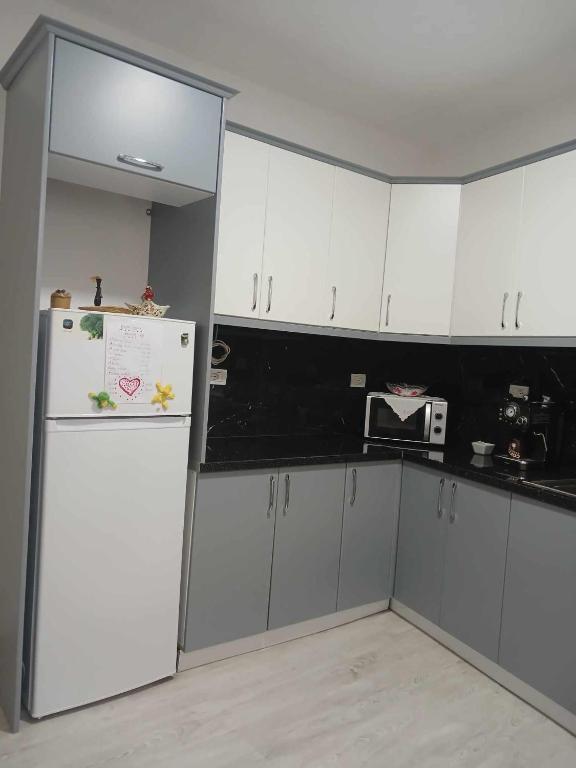 Kuchyň nebo kuchyňský kout v ubytování EniGuesthouse