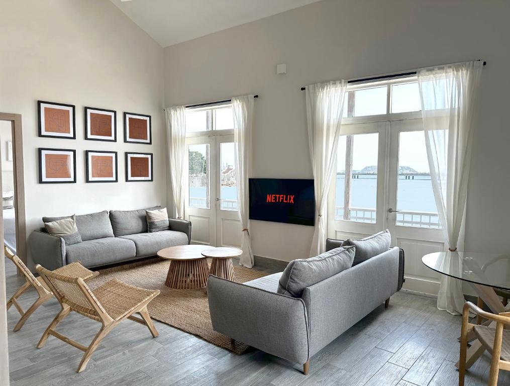 TV a/nebo společenská místnost v ubytování AmazINN Places Casa del Mar