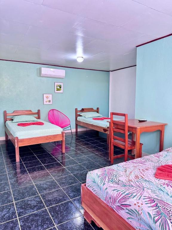 Postel nebo postele na pokoji v ubytování Hotel El Chaman