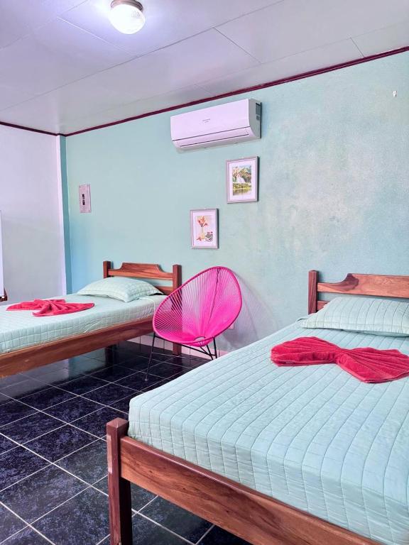 Postel nebo postele na pokoji v ubytování Hotel El Chaman