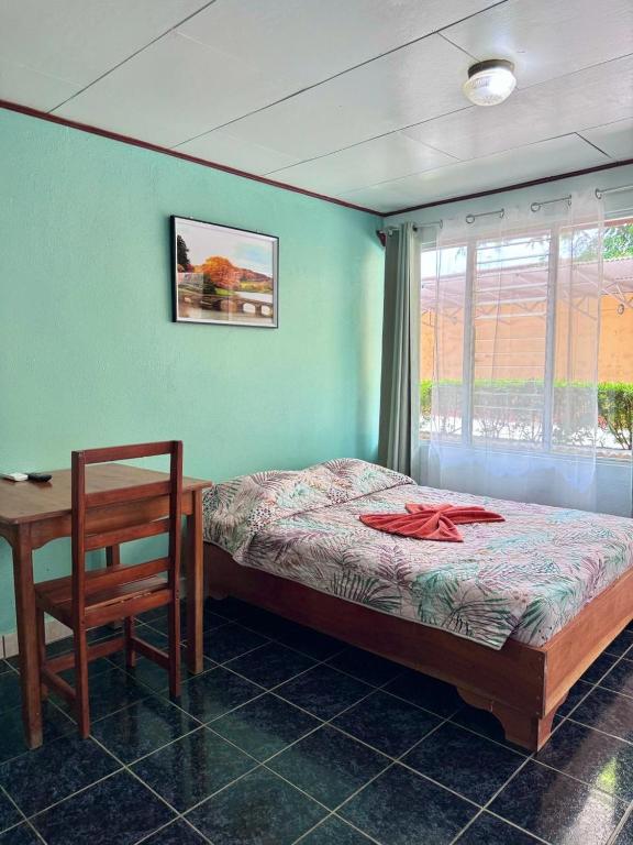 Postel nebo postele na pokoji v ubytování Hotel El Chaman