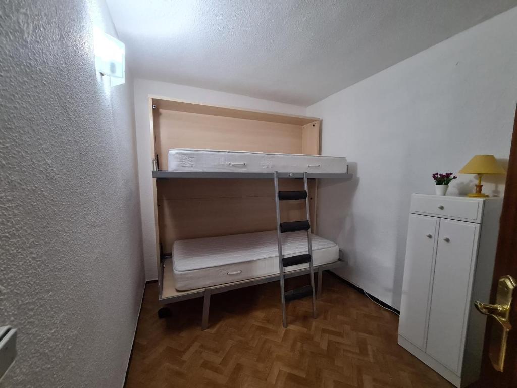 Postel nebo postele na pokoji v ubytování Apartamento Torre Colon IF Benidorm