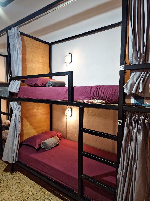 Postel nebo postele na pokoji v ubytování SEMERU HOSTEL MALANG