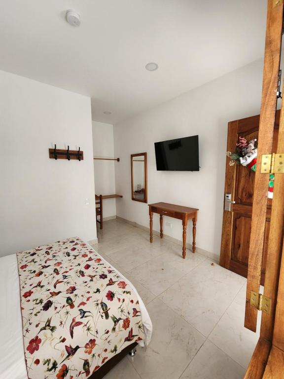 Postel nebo postele na pokoji v ubytování Casa Isabel Hotel