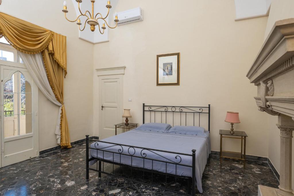Łóżko lub łóżka w pokoju w obiekcie Palazzo Rizzo