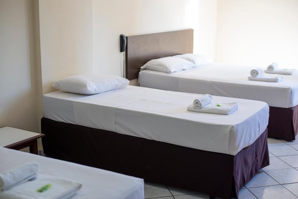 Postel nebo postele na pokoji v ubytování Smart Cataratas Hotel