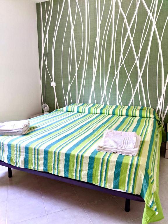 Postel nebo postele na pokoji v ubytování Apartment Difesa Pizzo