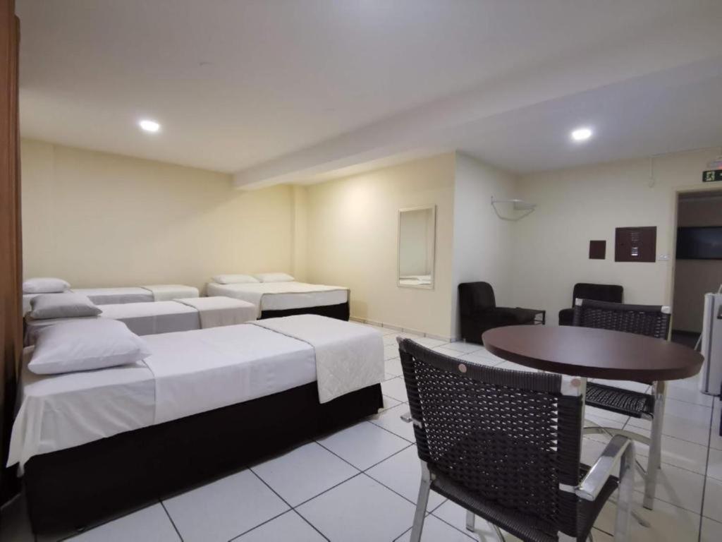 Postel nebo postele na pokoji v ubytování Smart Cataratas Hotel