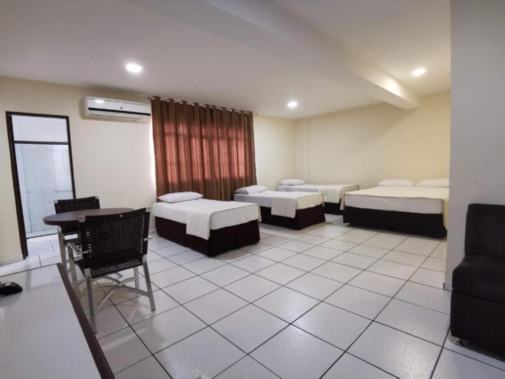Postel nebo postele na pokoji v ubytování Smart Cataratas Hotel