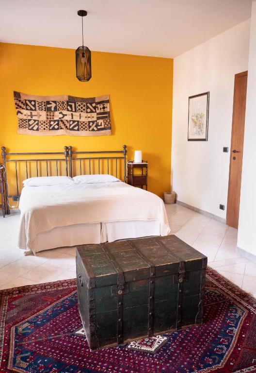 Postel nebo postele na pokoji v ubytování L'Aromatario