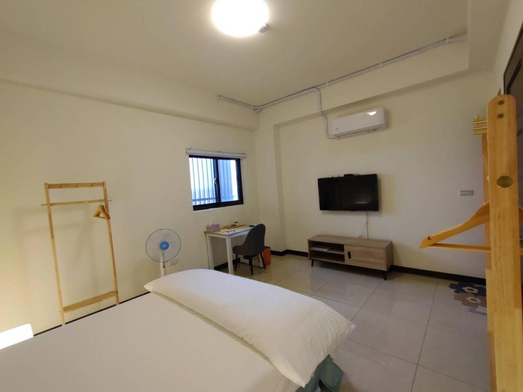 TV in/ali zabaviščno središče v nastanitvi Caiteng B&B