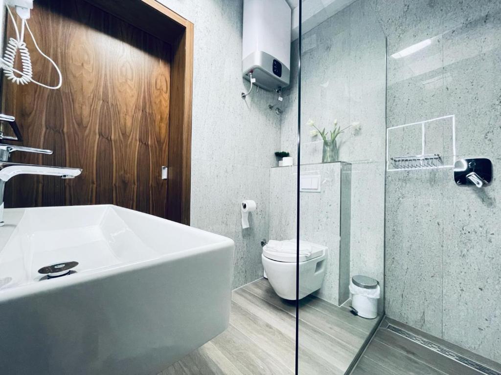 Kúpeľňa v ubytovaní Fazana City Rooms with free parking