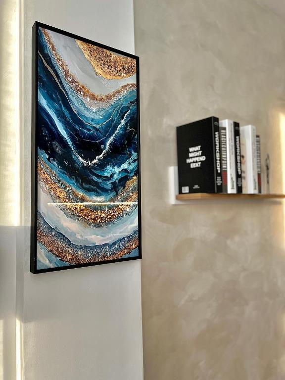 Příslušenství pro přípravu čaje a kávy v ubytování Stracciatella Homes Apartment