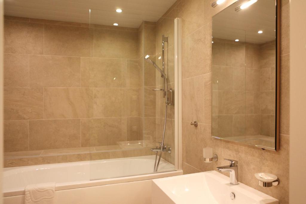 Koupelna v ubytování MyApartments