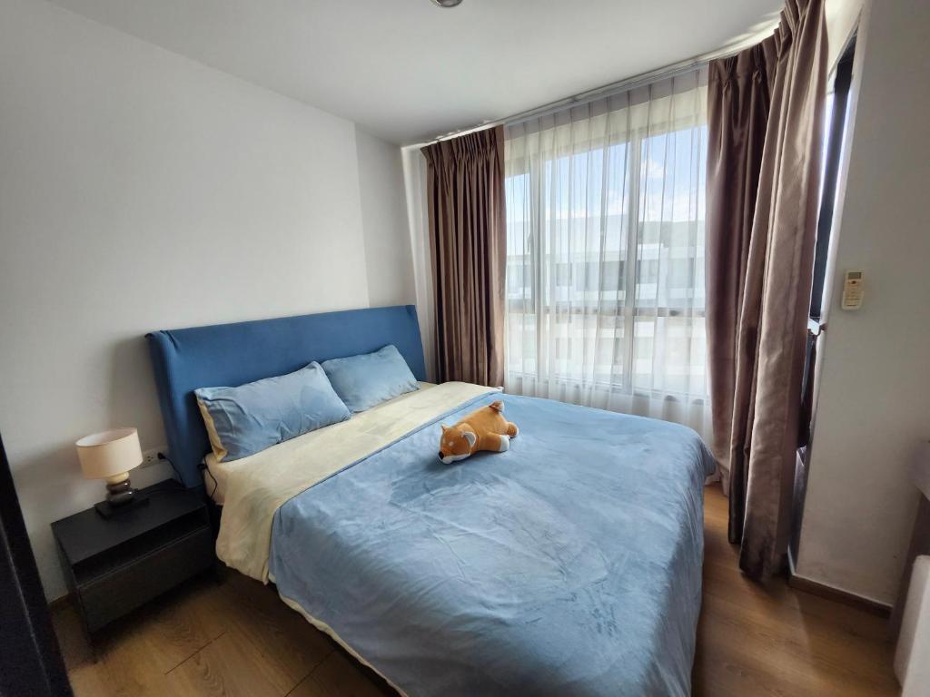 Postel nebo postele na pokoji v ubytování 中央公寓 1bedroom Centrio 804 Condominium 211