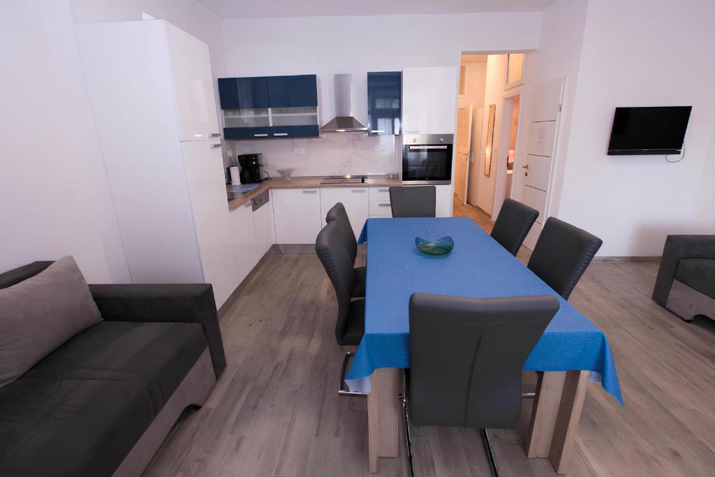 Televízia a/alebo spoločenská miestnosť v ubytovaní Accommodation Ventus