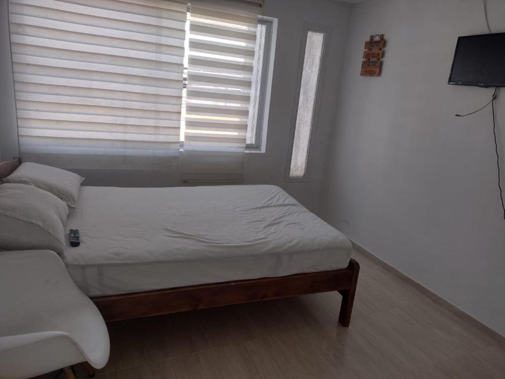 Ліжко або ліжка в номері Cabaña CAMI