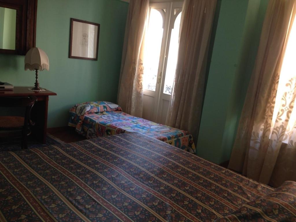 Hotel San Genesio - Dreibettzimmer