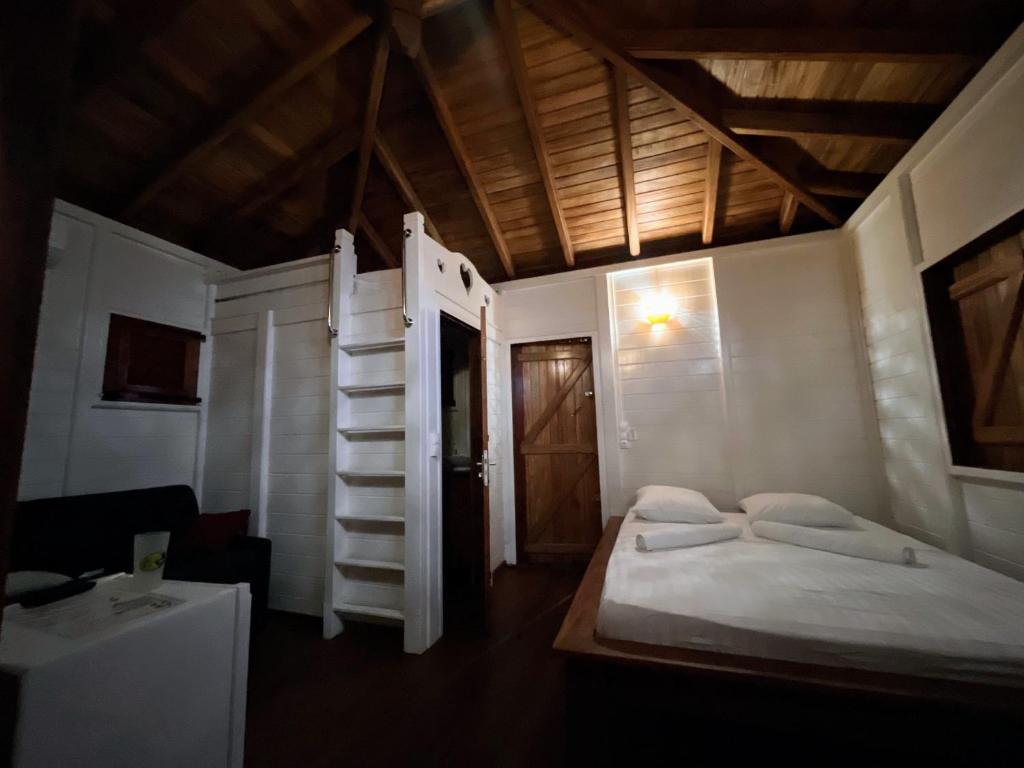 Letto o letti in una camera di Ti Kaz Açaï