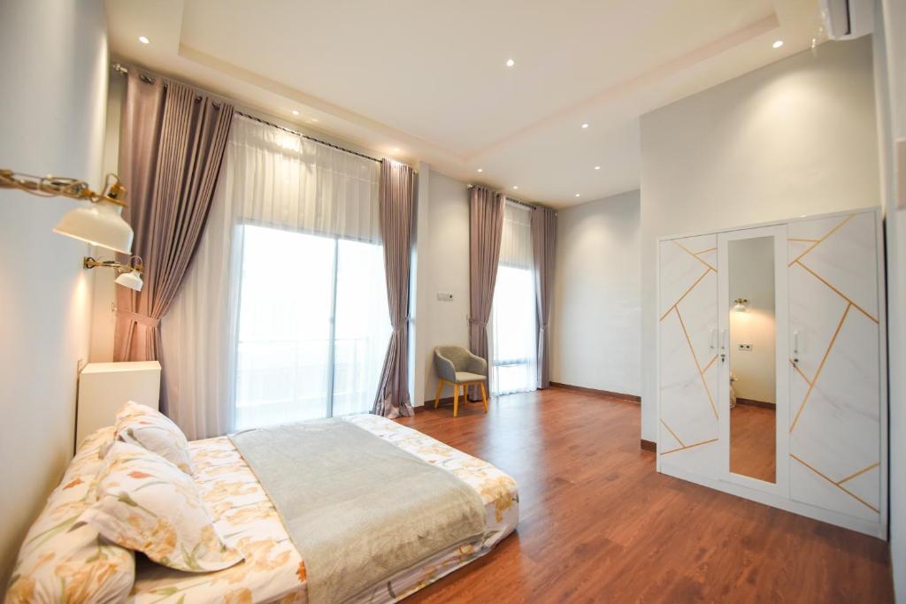 Uma cama ou camas num quarto em Homestay Batumas Singkawang