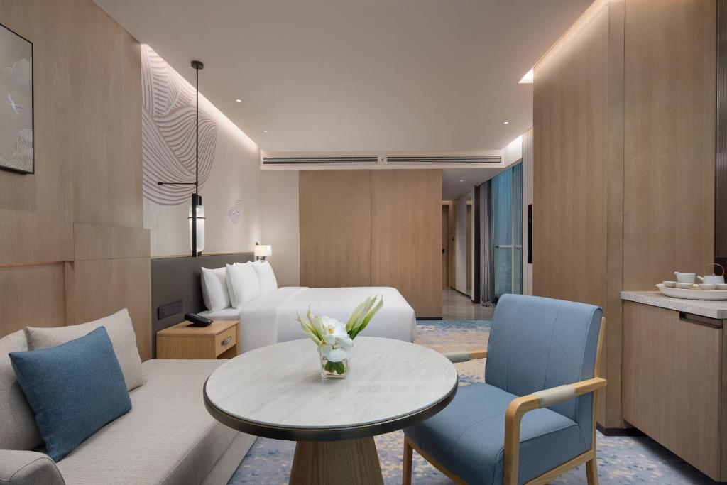 Posezení v ubytování Wyndham Hotel Guangzhou Huangbian Metro Branch - Free shuttle bus to Canton Fair