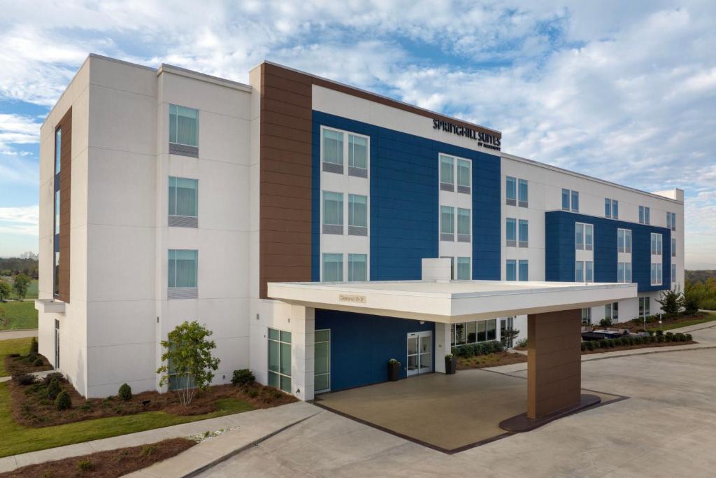 an office building with a blue and white facade at SpringHill Suites by Marriott Birmingham Gardendale in Gardendale