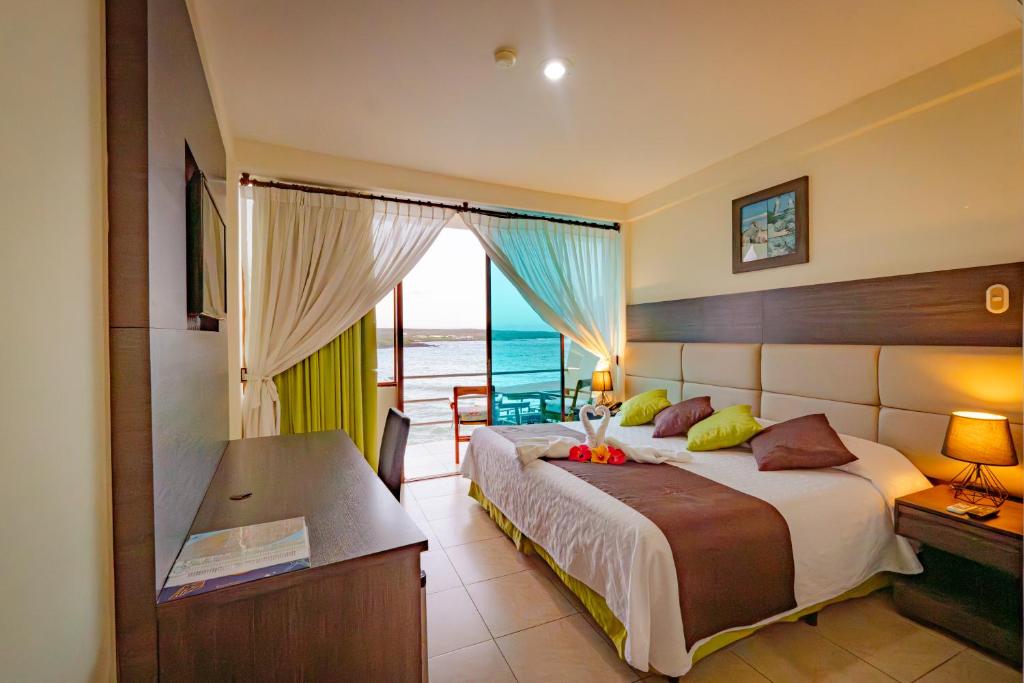 Postel nebo postele na pokoji v ubytování Hotel Solymar