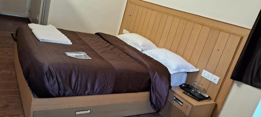 Letto o letti in una camera di Magizham Homestay