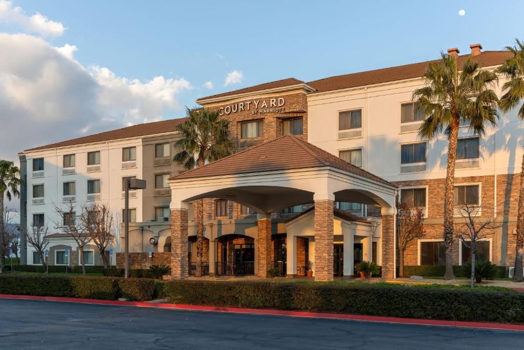 a hotel with a gazebo in front of a building at Courtyard by Marriott Ontario Rancho Cucamonga in Rancho Cucamonga